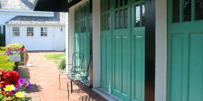 brick patio with chairs and flowers outside of Center for the Spiritual Journey